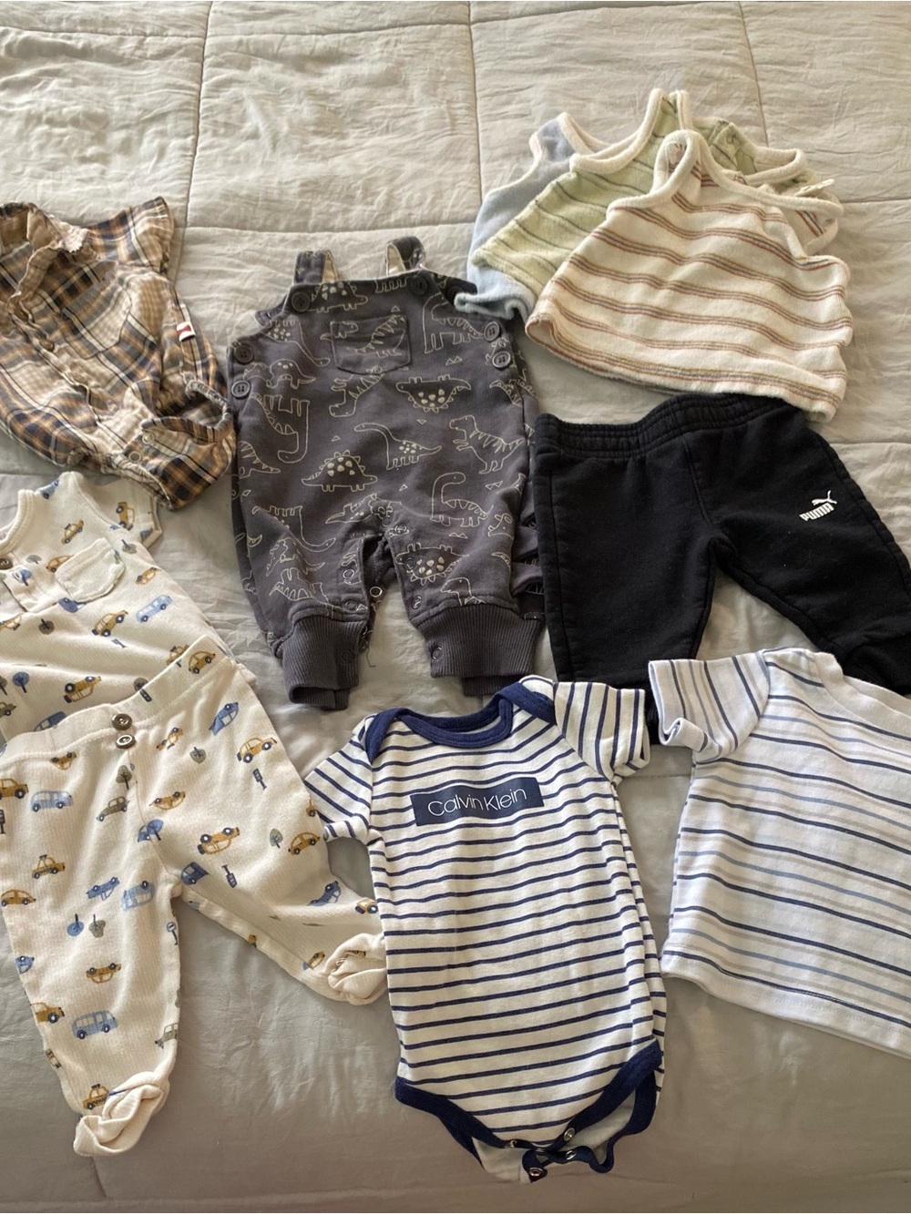 Calvin Klein Navy & White Striped Baby Onesie with Mixed Neutral Baby Clothing